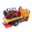 Camioneta cu platforma de remorcare MAN TGA si masina de teren Jeep  Bruder